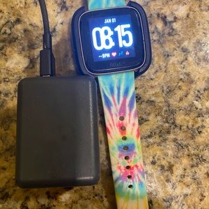 Fitbit Versa watch has 4 bands with it